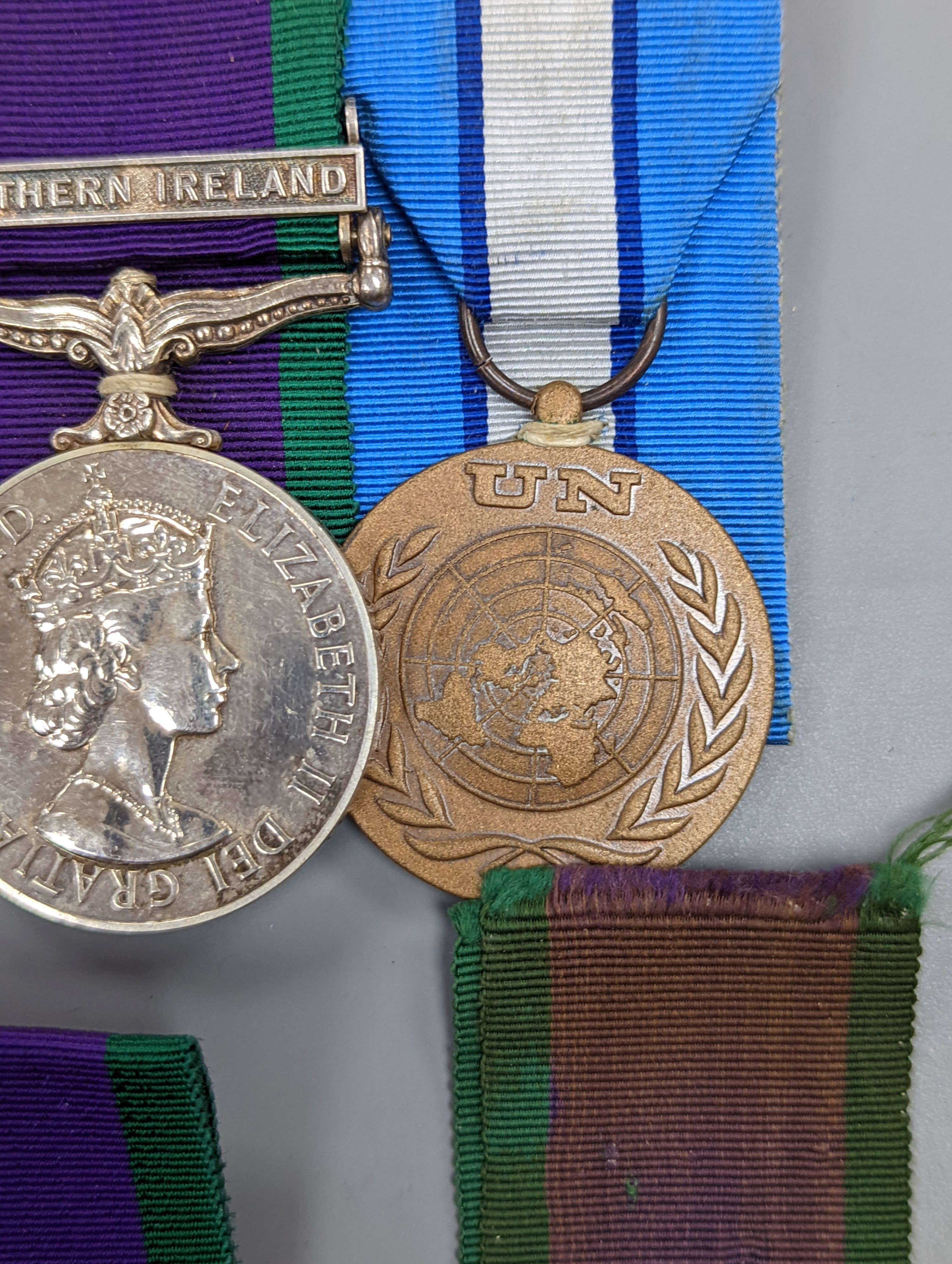 Five QEII GSM, three with a Northern Island clasp (one with UN medal), and two with South Arabia clasps